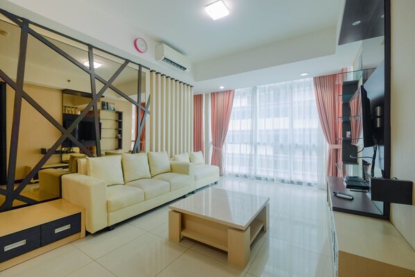 Living room - Modern 2BR Apartment at Kemang Village By Travelio (Jakarta)