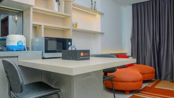 Quarto | Área de estar | TV