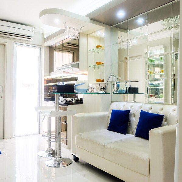 Room | Living area | TV - Posh 2BR Apartment at Bassura City near Shopping Mall (Jakarta)