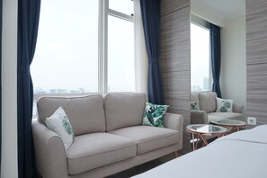 Standard Studio | Living room | TV - Cozy and Tranquil Studio Menteng Park Apartment (Jakarta)