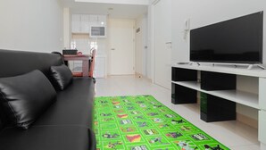Room | Living area | TV - Pool View 2BR Apartment @ Springlake Summarecon (Bekasi)