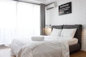 Bed sheets - Comfy & Artsy Studio at Beverly Dago Apartment (Bandung)
