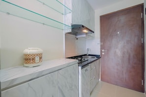 Private kitchenette - Cozy and Minimalist Studio Apartment @ Mustika Golf Residence (Cikarang)