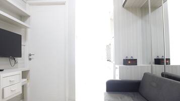 Quarto | Área de estar | TV