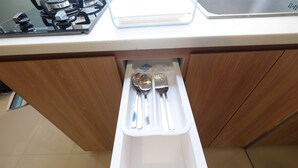A kitchen drawer with utensils. - New Modern Studio Apartment at Green Pramuka City (Jakarta)