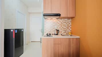 Quarto | Cozinha privada | Geladeira, cooktop, talheres/pratos/utensílios de cozinha