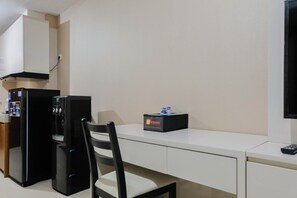Room | Private kitchenette | Fridge, stovetop, cookware/dishes/utensils - Spacious Fully Furnished Studio Apartment at U Residence (Curug)