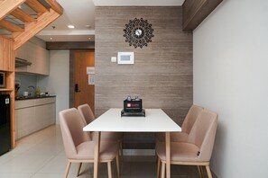 Room | In-room dining - Stunning 2BR Loft Apartment at Maqna Residence (Jakarta)