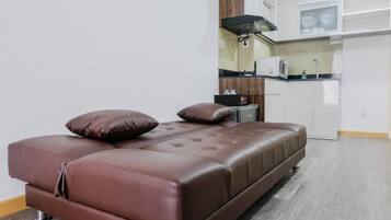 Quarto | Área de estar | TV