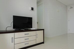 Television - Luxurious and Comfy 2BR Paddington Heights Alam Sutera Apartment (Tangerang)