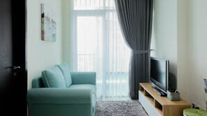 Room | Living room - Cozy and Tidy 1BR Apartment at Brooklyn Alam Sutera (South Tangerang)