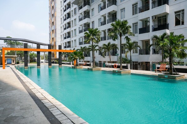 Outdoor pool - Comfy 2BR with Sofa Bed at Gardenia Boulevard Apartment (Jakarta)