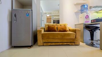 Quarto | Área de estar | TV