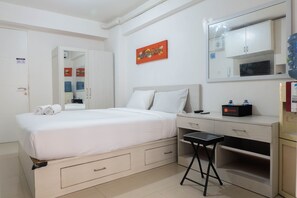 Quarto | Área de estar | TV