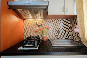 Private kitchen - Comfy Studio Room Apartment at Kebagusan City (Jakarta)