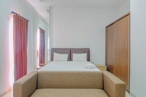 Room | Free WiFi, bed sheets - Deluxe Studio Apartment @ Azalea Suites Cikarang (Cikarang)