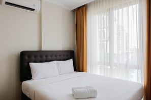 Room | 1 bedroom, bed sheets - Cozy Stay 1BR at Asatti Apartment (Pagedangan)