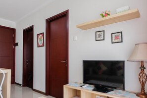 Room | Television - Cozy Stay 1BR at Asatti Apartment (Pagedangan)
