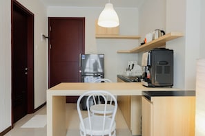 Room | Private kitchenette - Homey and Simple 1BR at Asatti Apartment (Pagedangan)