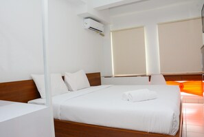 Room | Free WiFi, bed sheets - Comfy Studio Room at Patraland Urbano Apartment (Bekasi)