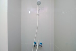 Bathroom - Comfy Studio Bogorienze Resort Apartment near The Jungle Fest By Travelio (Bogor)