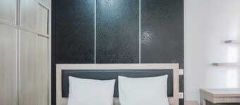 Comfy Studio at Trimezia Beverly Apartment By Travelio
