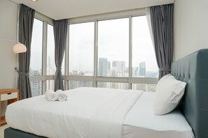 Room | 2 bedrooms, free WiFi, bed sheets - Relaxing 2BR at The Empyreal Condominium Epicentrum Apartment By Travelio (Jakarta)