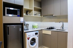 Room | Laundry - Best View 1BR Apartment at Gold Coast PIK By Travelio (Jakarta)