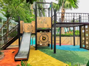 Children’s play area – outdoor - Luxurious 2BR at Skandinavia Apartment By Travelio (Tangerang)