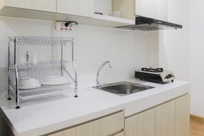 Room | Private kitchen - New Furnished Studio Apartment at M-Town Residence By Travelio (Gading Serpong)