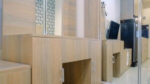 Room | Living room | TV - Premium Studio @ Grand Kamala Lagoon Apartment By Travelio (Bekasi)
