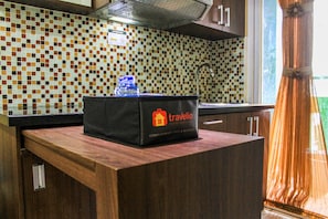 Room | Living room | TV - Comfortable and Tranquil 2BR Apartment at Green Pramuka By Travelio (Jakarta)