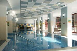 Indoor pool, seasonal outdoor pool, pool umbrellas, sun loungers