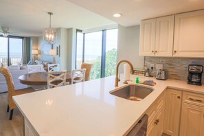 Fridge, microwave, dishwasher, coffee/tea maker