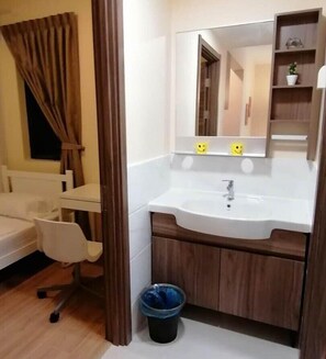 Shower, hair dryer, slippers, towels