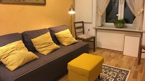 Apartment, 1 Bedroom | Living room | 27-inch flat-screen TV with digital channels, TV - Sebastian Apartment  in The Old Town (Kraków)