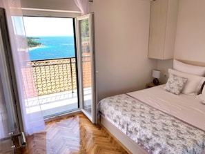 Superior Apartment | Premium bedding, down comforters, memory foam beds