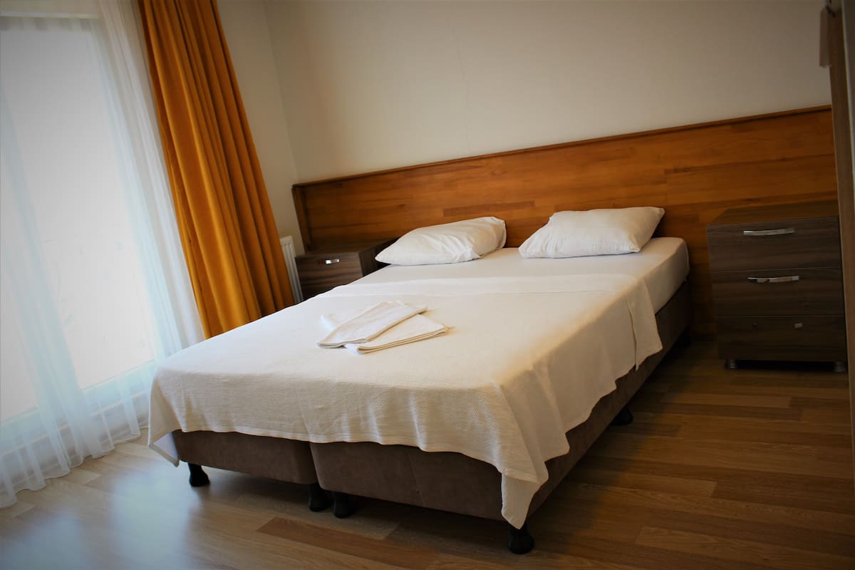 Comfort appartement | 1 slaapkamer, luxe beddengoed, donzen dekbedden, Select Comfort-bedden