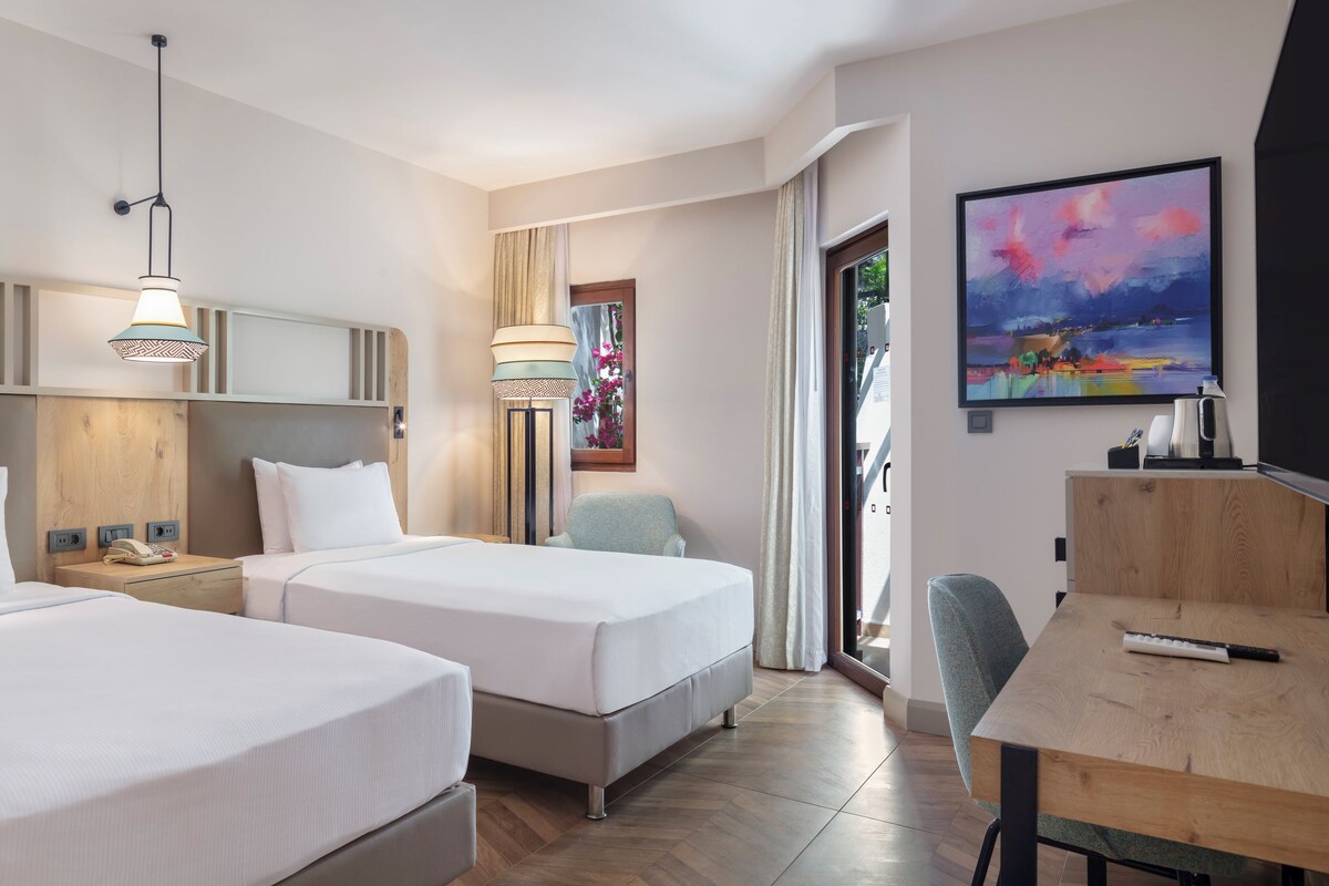 Room, 2 Single Beds | Minibar, in-room safe, desk, laptop workspace
