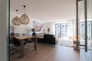 Enjoy meals in the dining area with a city view.