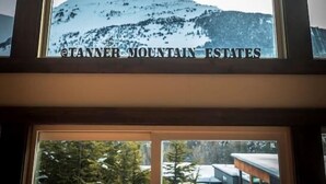 A framed photograph of a mountain with the text "Tanner Mountain Estates" at the bottom. - Jeremys Mountain Chalet @jeremysmountainchalet (Anchorage)