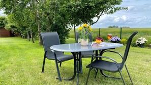 Lägenhet Deluxe - privat badrum - utsikt mot trädgården (Garten-1Schlafzimmer-DG) | Trädgård