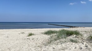 Lägenhet Deluxe - privat badrum - utsikt mot trädgården (Garten-1Schlafzimmer-DG) | Strand