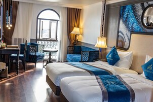 Premium bedding, down comforters, memory foam beds, minibar