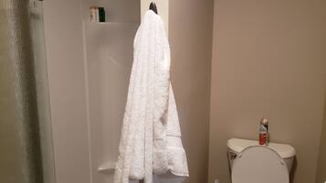 Shower, towels, soap, shampoo