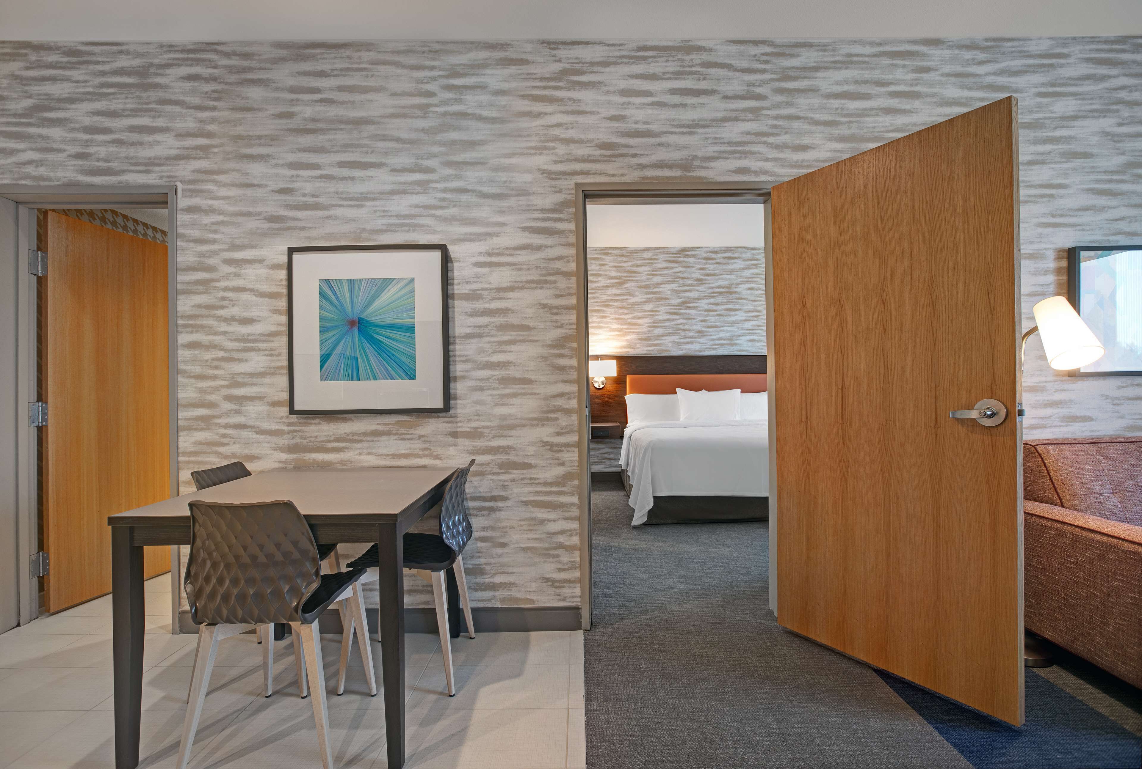 suite, 1 king bed, accessible, non smoking (roll-in shower) | living area | 49-inch lcd tv with cable channels, tv