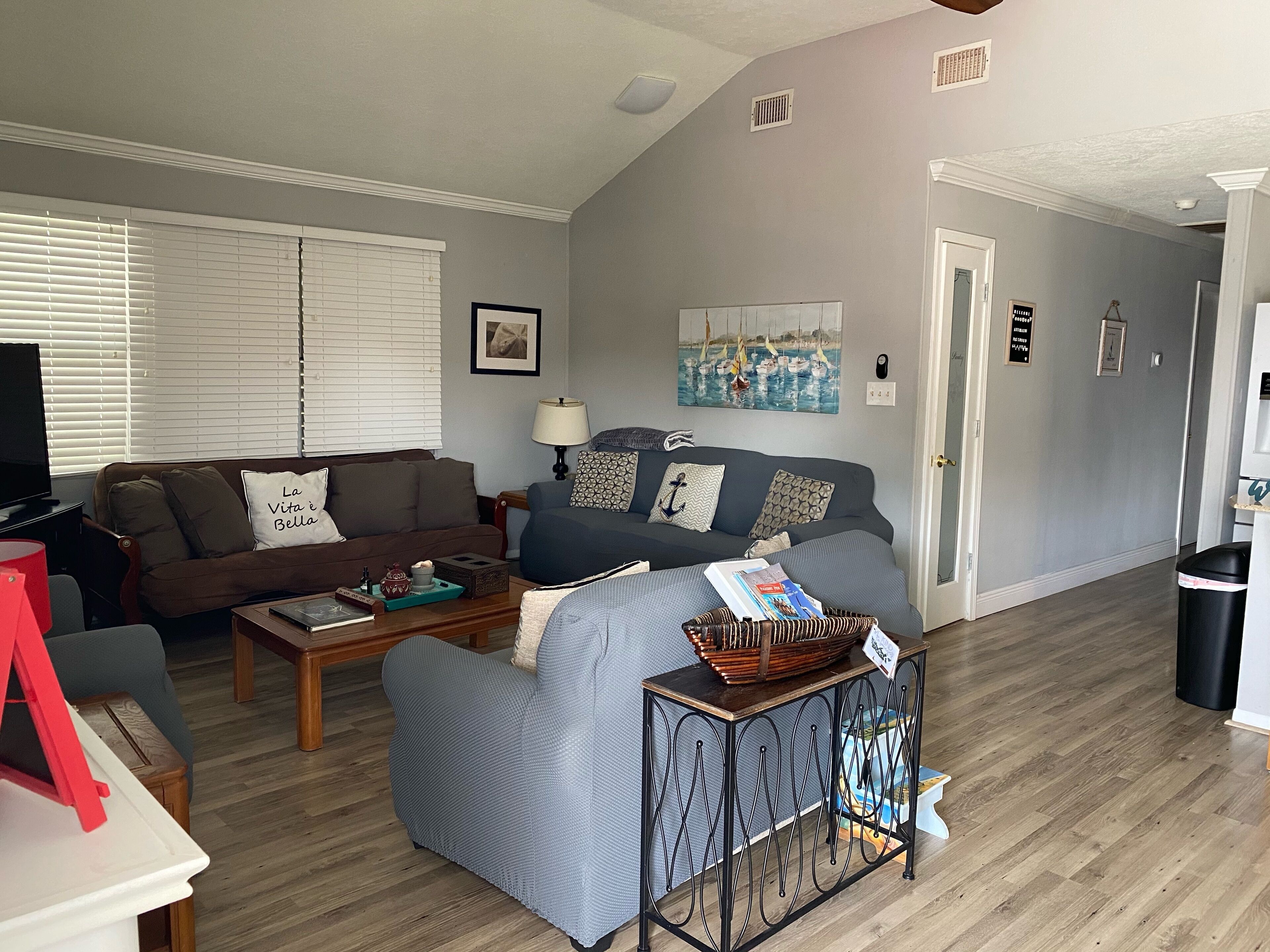 Living Room with sofa, Loveseat, Chair, and Queen Futon.