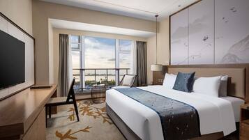 Deluxe Room, 1 King Bed, Non Smoking | 1 bedroom, free minibar items, in-room safe, individually decorated