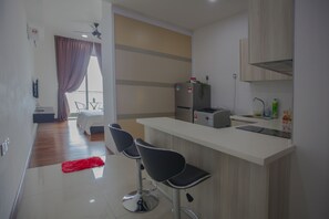 unit A-23-09 | Private kitchenette | Full-size fridge, microwave, stovetop, electric kettle