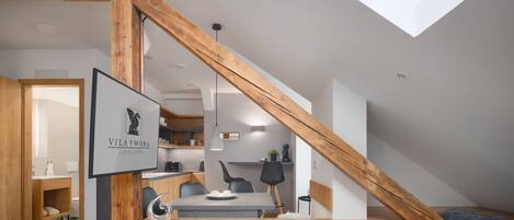 Deluxe Attic Apartment (Apt.9) | Living area | 41-inch LCD TV with cable channels, TV